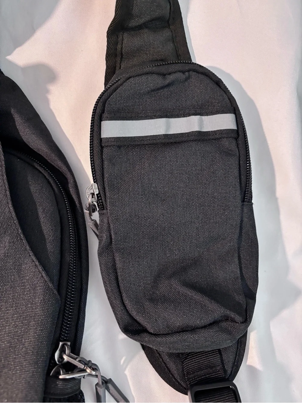 Waterfly Black Sling Backpack Crossbody Travel Bag Side Elastic Mesh Pockets